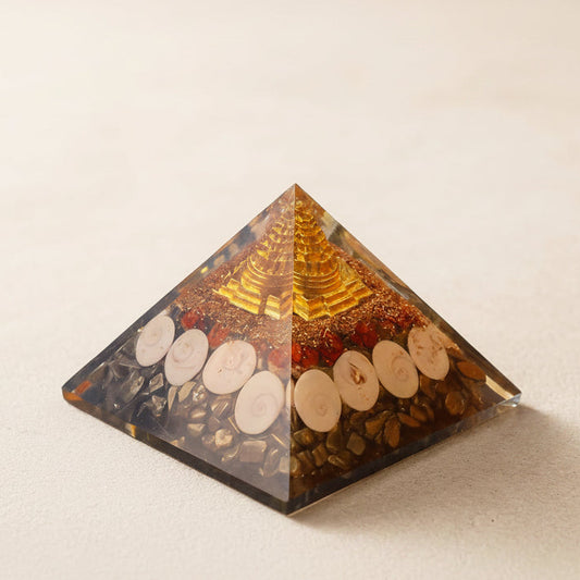 Orgone pyramid with Lakshmi Shri Yantra Gomati Chakra Rudraksha and copper shavings for wealth – Matrikas

