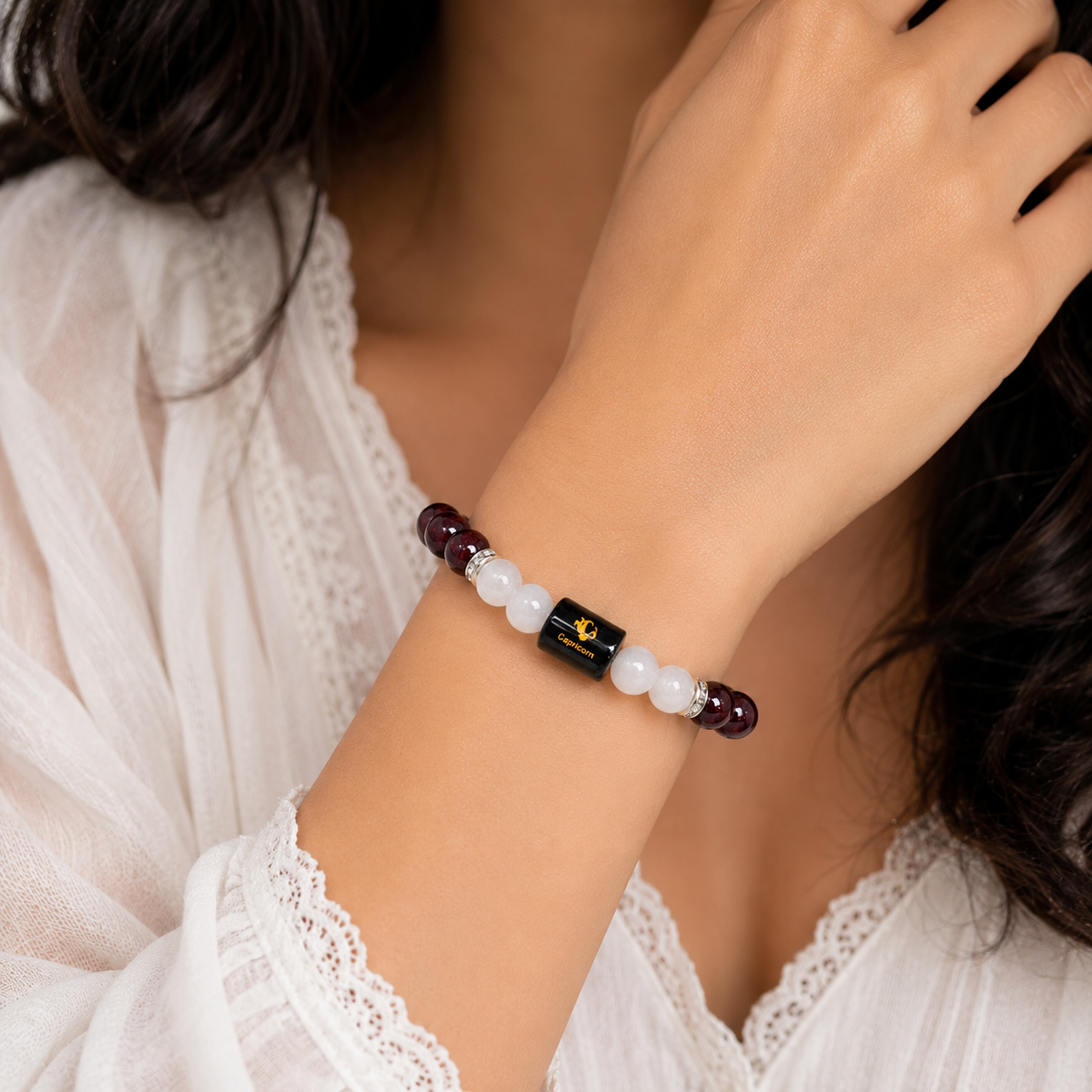 Capricorn Zodiac Bracelet worn on wrist - lifestyle shot